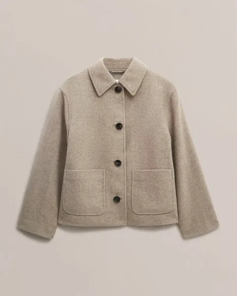 Expert dry cleaning and pressing for coats & jackets in Kuwait