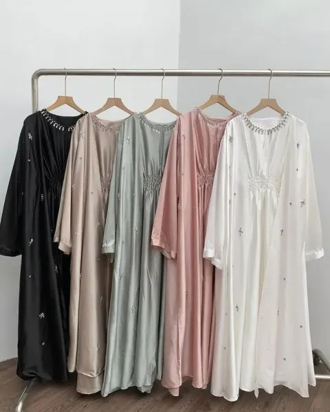 Expert dry cleaning and pressing for dresses & evening wear in Kuwait