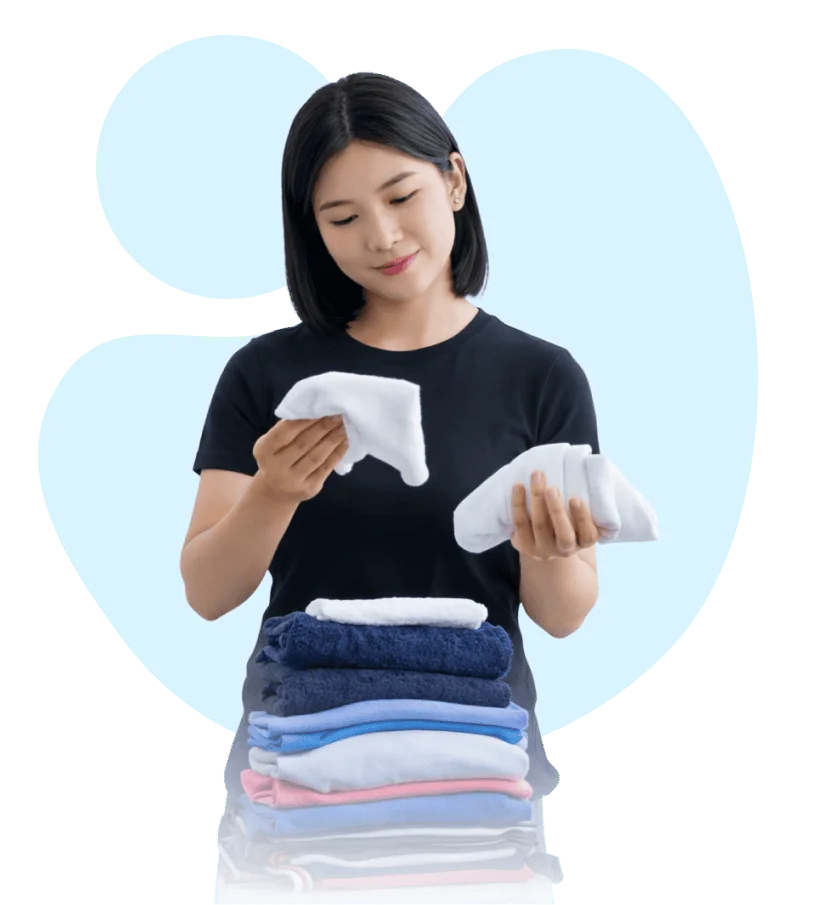 Freshly folded laundry stack representing our premium wash and fold service